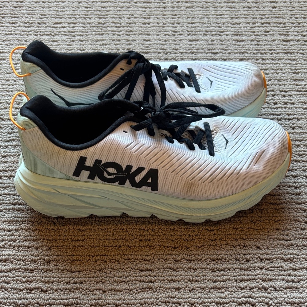 Hoka White and Black Sneakers with Orange Accents
